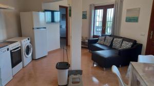 Kuchyň nebo kuchyňský kout v ubytování Maison avec logement indépendant piscine privée et vue mer
