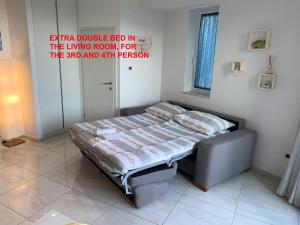 Posteľ alebo postele v izbe v ubytovaní Apartment Natalija
