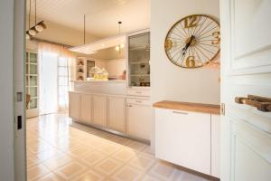 A kitchen or kitchenette at Dolce Favola Nomad Casa - Kalamata's City Getaway