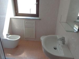 Koupelna v ubytování La Corte B&B