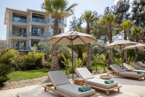Vonkajšia záhrada v ubytovaní MAKO Sea & Suites