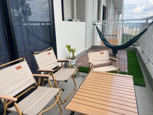 Balkón nebo terasa v ubytování Aisha staycation wifi big patio Putrajaya