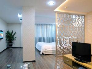 Giường trong phòng chung tại Super 8 Hotel Fuzhou Jinjishan