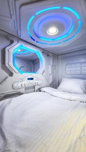 Postel nebo postele na pokoji v ubytování Capsula hotel
