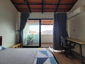 Postel nebo postele na pokoji v ubytování Noi Bai Flight Path Homestay