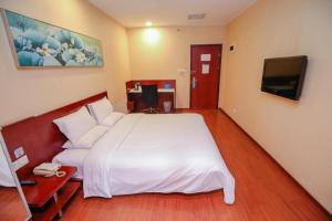 Krevet ili kreveti u jedinici u okviru objekta Hanting Hotel Beijing Wangfujing Avenue