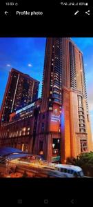 a picture of a tall building in a city at Raymond Apartment Times Square kuala Lumpur in Kuala Lumpur