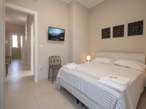 En eller flere senge i et værelse på Charming villa close to the beach - Beahost
