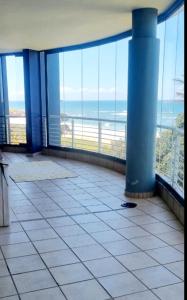 a large room with a view of the ocean at Indigo Bay 29 in Margate