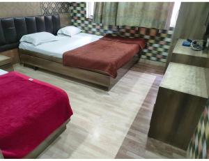 เตียงในห้องที่ Hotel prince palace & restaurant , Ajmer
