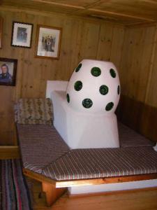 a cake sitting on a bench in a room at Prantl Roswitha in Sölden