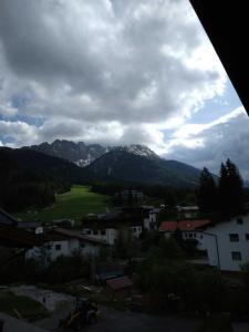 a view of a town with mountains in the background at Alpenstern in Biberwier