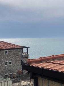 a view of the ocean from a building at Apartments Gusar in Ulcinj