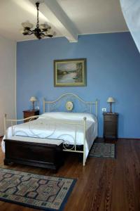 מיטה או מיטות בחדר ב-La Ca' Vegia