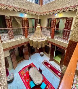 an overhead view of a building with a chandelier at Riad el wazania in Rabat