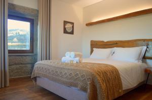 Postel nebo postele na pokoji v ubytování Quinta do Limite - Agroturismo
