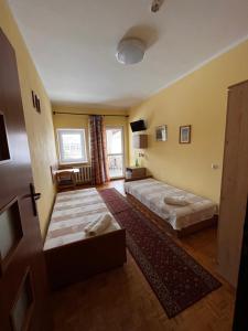 Cama o camas de una habitación en Dom św. Stefana