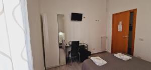 Televiisor ja/või meelelahutuskeskus majutusasutuses Piumith Guest House