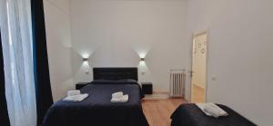 Voodi või voodid majutusasutuse Piumith Guest House toas