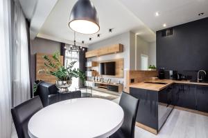 Virtuve vai virtuves zona naktsmītnē RentPlanet - Apartament Wieliczka