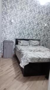 Cama ou camas em um quarto em GTNL Aparthotel
