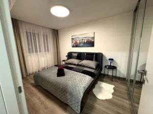 Un pat sau paturi într-o cameră la Kramare 321