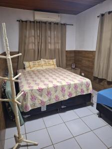 Llit o llits en una habitació de Casa de campo em Gravatá