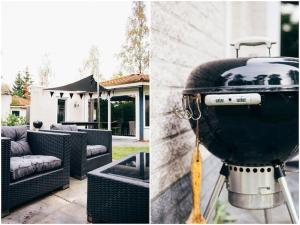 a grill sitting on the side of a house at COSY Holiday Home in Harderwijk