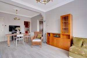 a living room with a table and a couch at Sea View Retreat in Buyukada 1 min to Ferry in Istanbul