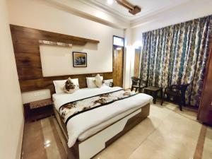 Voodi või voodid majutusasutuse The Boho Udaipur toas