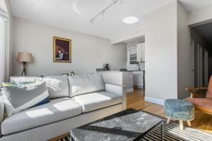 a living room with a couch and a table at Marina District 2BR w WD nr Parks Presidio SFO-434 in San Francisco