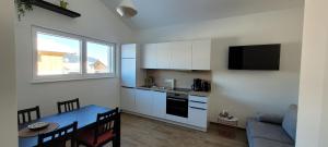 Köök või kööginurk majutusasutuses Appartement Petersberg +31 fotot