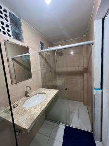 a bathroom with a sink and a shower at Ladeira de Olinda in Olinda +132 photos