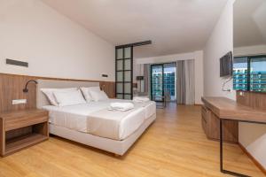 Letto o letti in una camera di Calypso Palace
