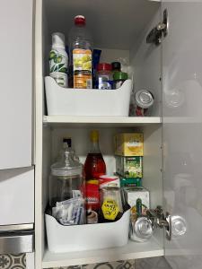 a refrigerator filled with lots of food and drinks at alisios loft in Las Palmas de Gran Canaria