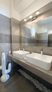 Koupelna v ubytování DIIO Suites