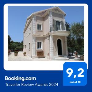 uma imagem de uma casa com as palavras prémios de avaliação de viagens em Luxury Villa Breeze with Private Pools em Dassia