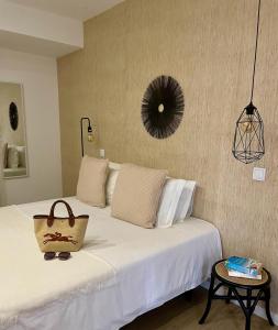 Ένα ή περισσότερα κρεβάτια σε δωμάτιο στο Marsuites +35 φωτογραφίες