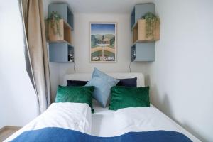 Кровать или кровати в номере Zauberhaftes Quartier für 4