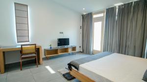 TV a/nebo společenská místnost v ubytování Bir Valley Retreat