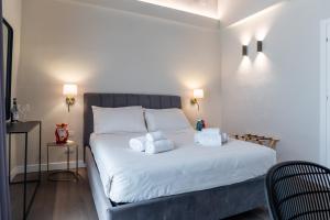 Bastione Spasimo Boutique Hotel客房内的一张或多张床位