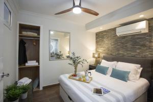 Ένα ή περισσότερα κρεβάτια σε δωμάτιο στο SingularStays Xativa III