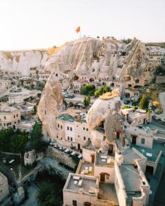 an aerial view of a village on a mountain at Cappadocia Cave Suites Adult Only in Goreme
