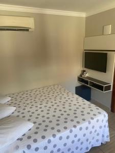 Ένα ή περισσότερα κρεβάτια σε δωμάτιο στο Residencial Cecilia Cruz +3 φωτογραφίες