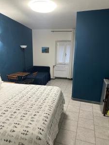 Postel nebo postele na pokoji v ubytování Ca Du Grifun 2