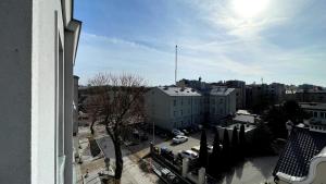 a view of a city from a window of a building at Apartamenty na ZŁOTEJ - 100 m od CENTRUM in Kielce