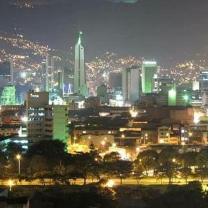 a view of a city at night with lights at usoinmobiliario in Medellín