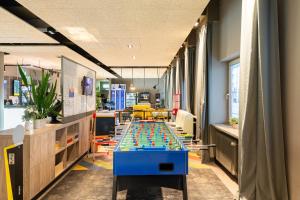 a room with a table with legos on it at a&o Nürnberg Hauptbahnhof in Nürnberg