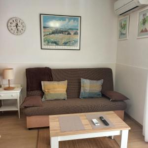 A seating area at Verdemar Apartamento l