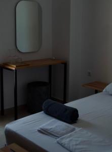 Postel nebo postele na pokoji v ubytování ATHOS CAPE